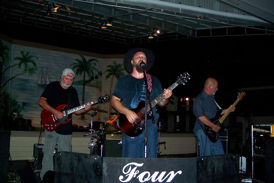 Four Barrel performing live on stage