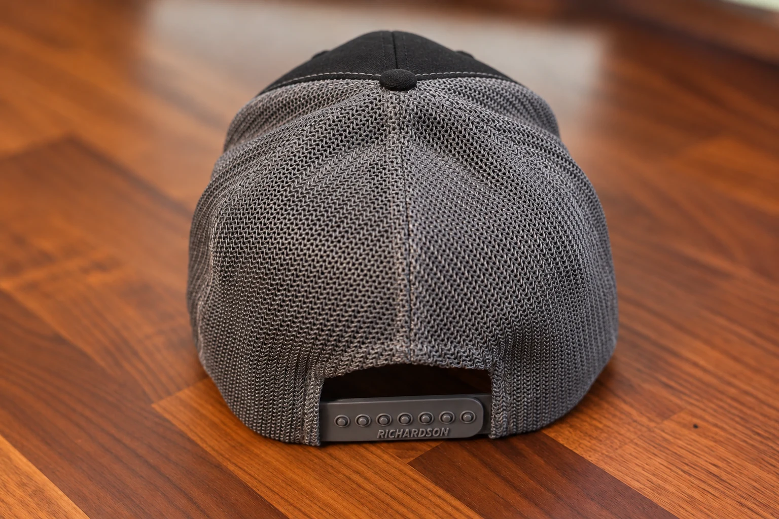 Back view of Four Barrel hat and snapback closure